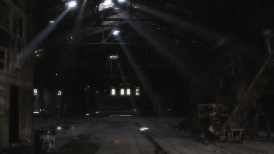 Sunlight streams through holes in the roof of a dark, abandoned warehouse, illuminating dust motes.