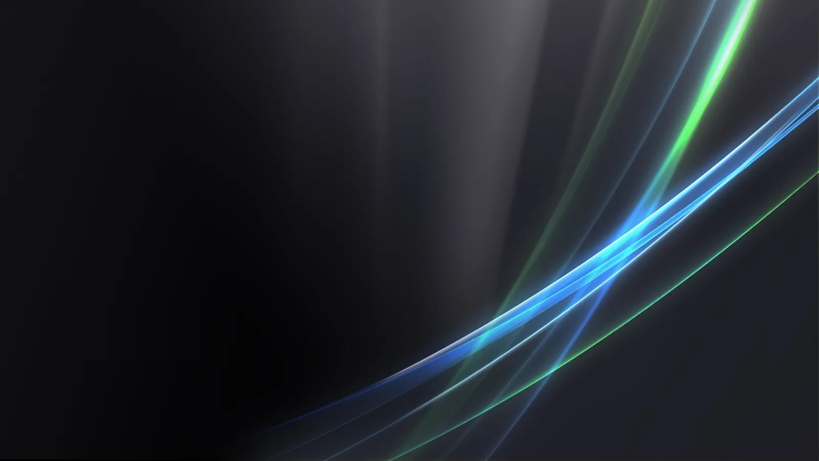 Abstract streaks of blue and green light flow across a dark background.