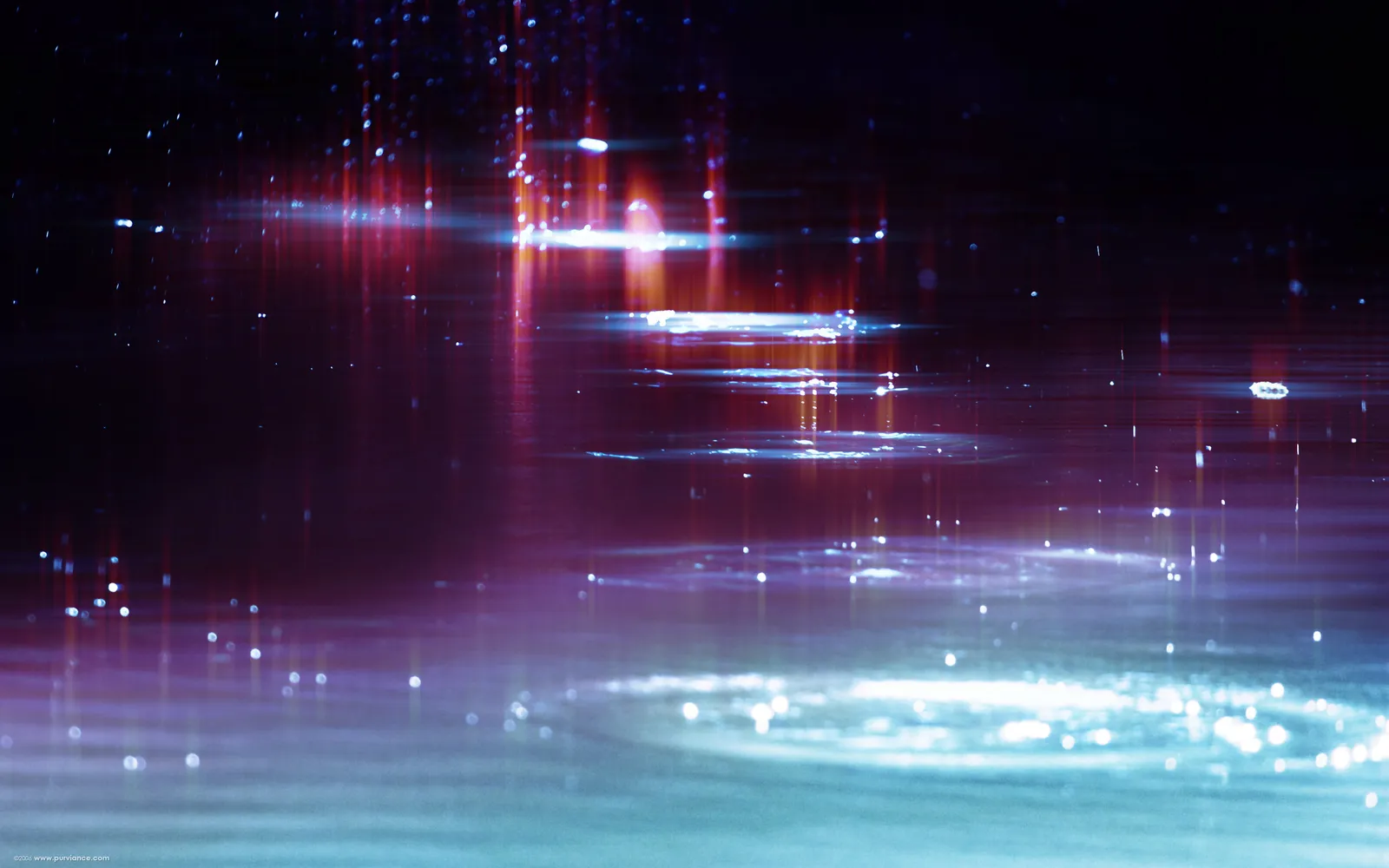 Abstract image of colorful light reflections and ripples on a dark water surface.