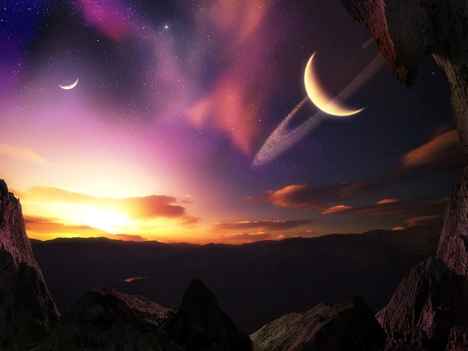View from a rocky outcrop on an alien planet at sunrise, with a ringed moon and crescent moon in the colorful sky.