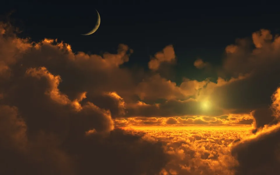 A crescent moon hangs in the twilight sky above a sea of clouds illuminated by a golden sunset.