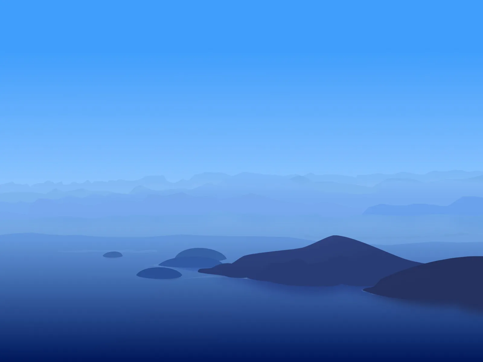 Layered blue mountains fade into the distance over a calm body of water under a clear blue sky.